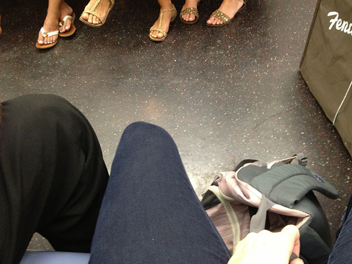 Angry Woman Fights Back Against Men Who Manspread on Subway, See How They React